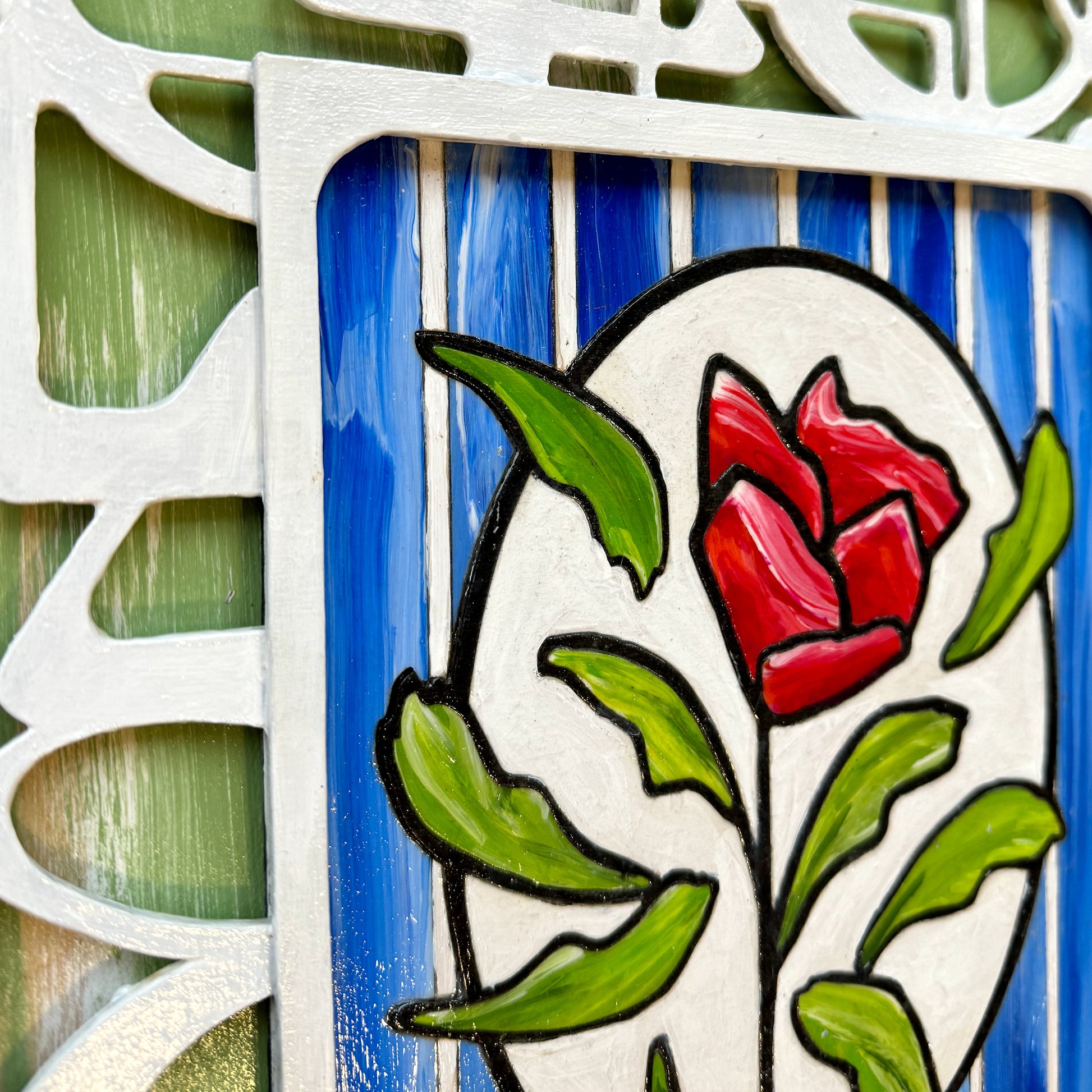 3D Red Rose artwork. A single rose stands out against a pristine white geometric trellis and sky-blue backdrop - a symbol of elegance and individuality. the stacked layers of birchwood panels creates unique shadows 