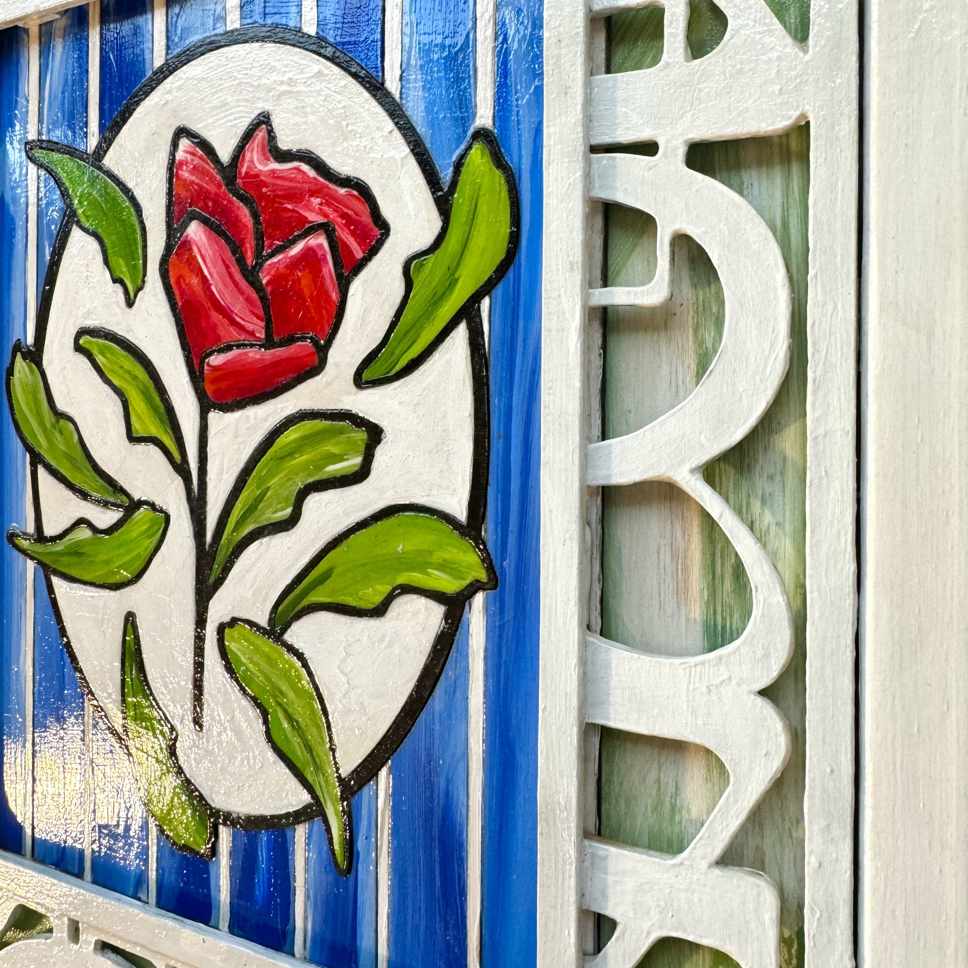 3D Red Rose artwork. A single rose stands out against a pristine white geometric trellis and sky-blue backdrop - a symbol of elegance and individuality. the stacked layers of birchwood panels creates unique shadows 