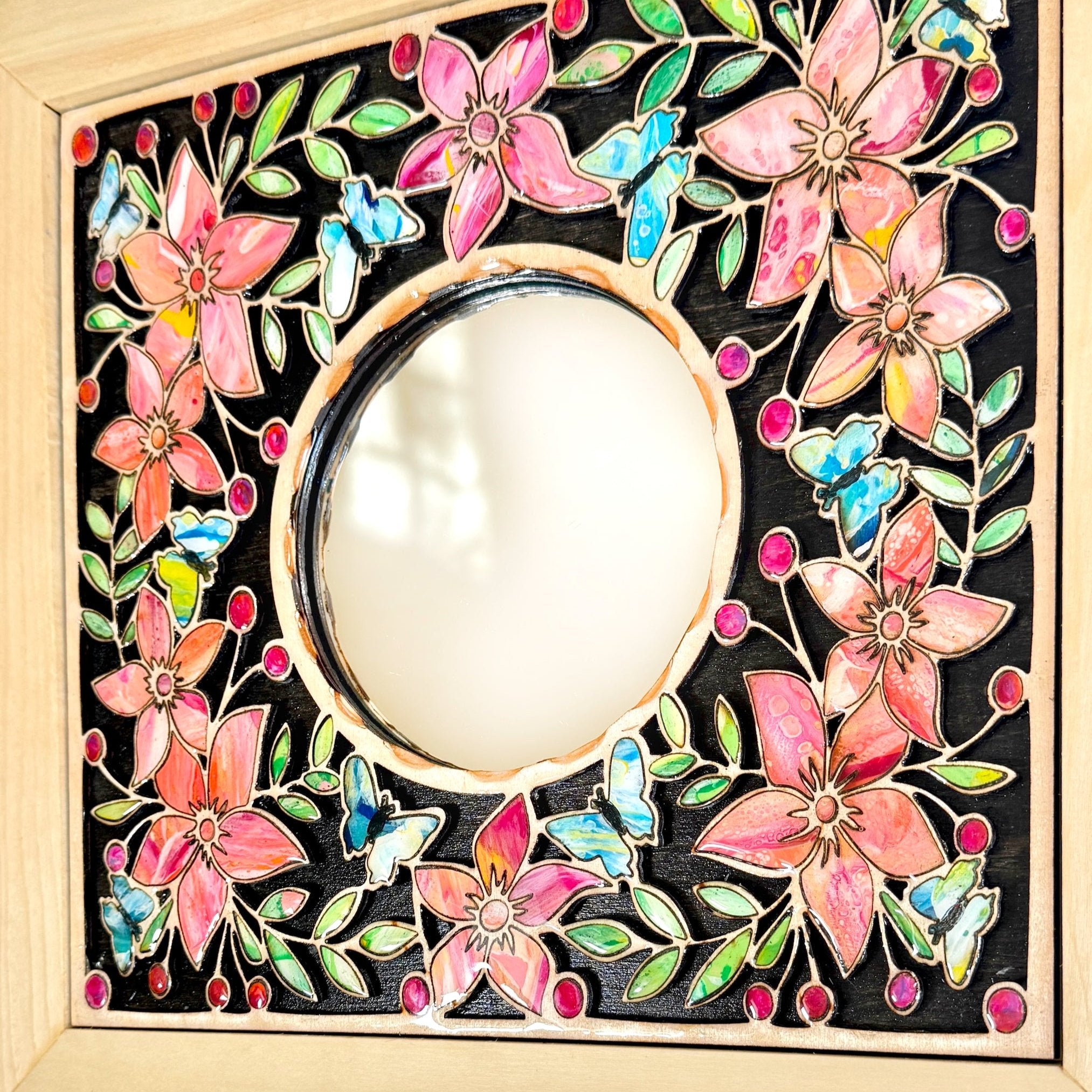 detail of mirror framed with inlaid wood-painted flowers, leaves and butterflies, Pashley Creations