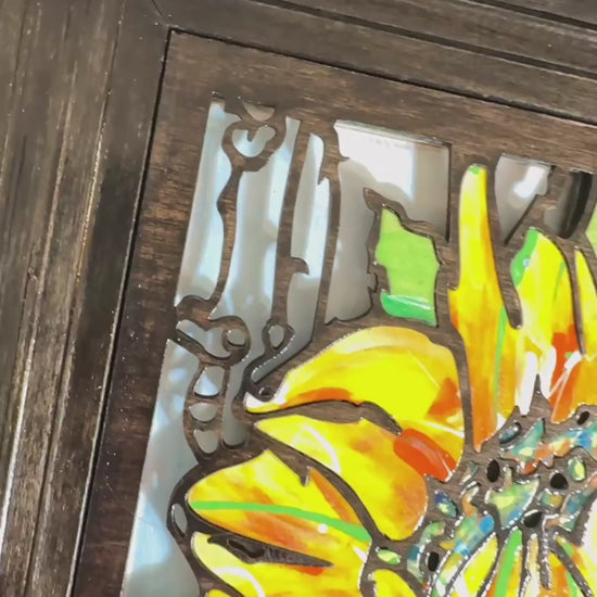 Sunflower inlaid mosaic 3D wood wall sculpture yellow flower with blue and green geometric abstract shapes in the background. video